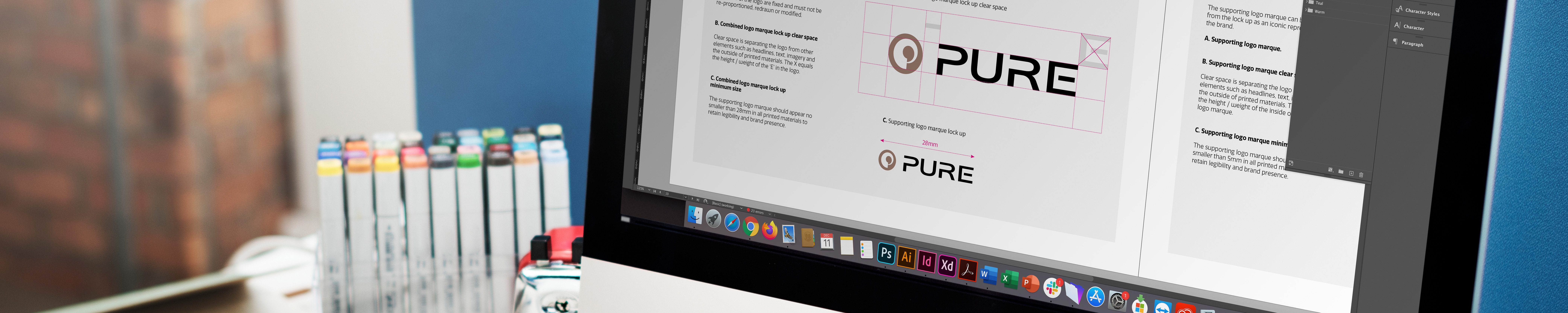 Pure Digital logo brand on iMac banner
