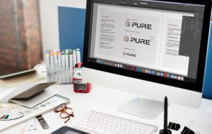 Pure Digital logo brand on iMac