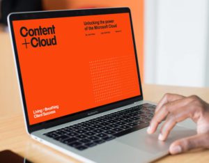 Content + Cloud website on laptop