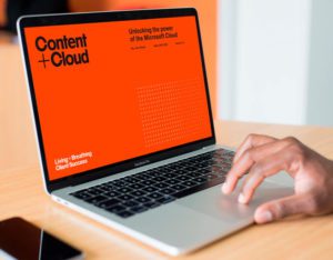 Content + Cloud website on laptop